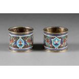 A PAIR OF SILVER-GILT AND CLOISONNÉ ENAMEL NAPKIN HOLDERS Russian, Moscow, Iuka Khaimovitch