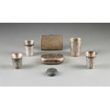 A SILVER AND NIELLO SNUFFBOX, FOUR VODKA BEAKERS AND TWO METAL CASES Russian, Moscow, 19th century