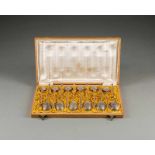 A SET OF TWELVE SILVER-GILT SPOONS Russian, Moscow, 1892 The bowls engraved with foliage and