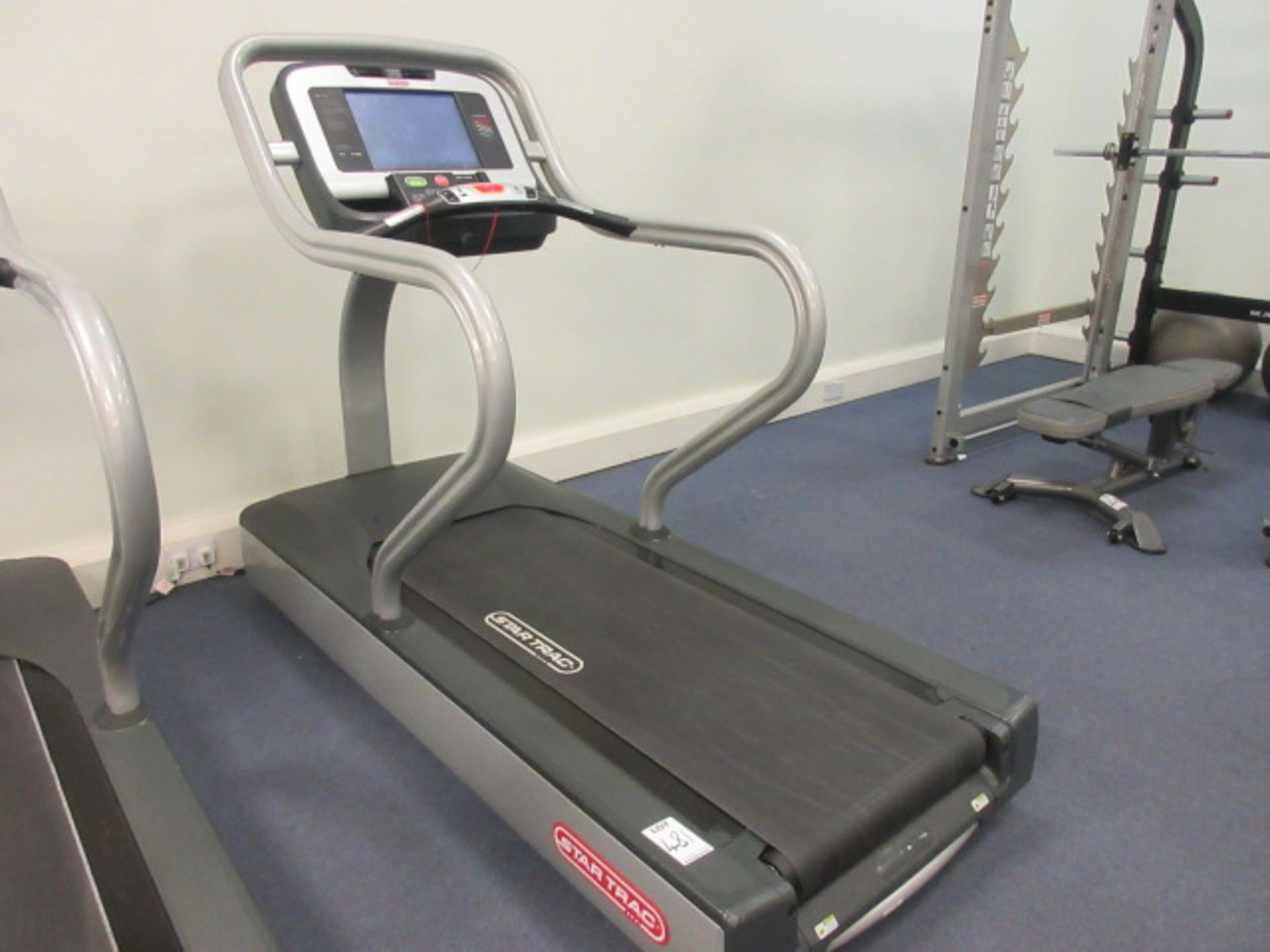 Star Trac E TRX Running Machine. Touch screen control. Nike+ ipod docking station Townholm Site.