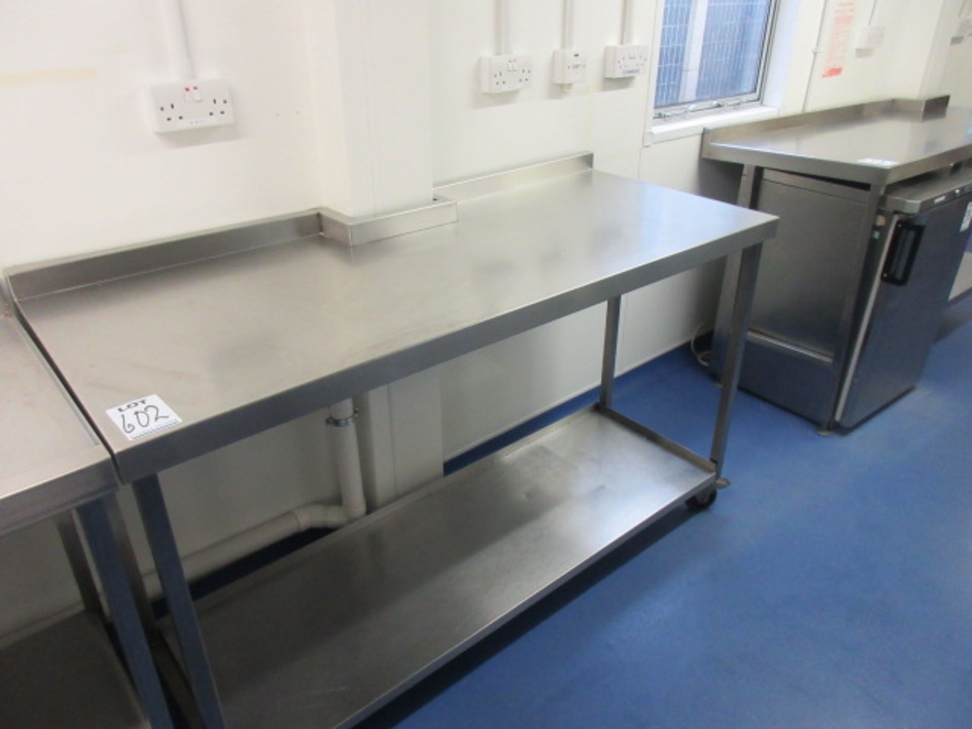 Stainless Steel Table. Size 1550 mm x 650 mm. Mobile. Centre cut out size 230 mm x 130 mm