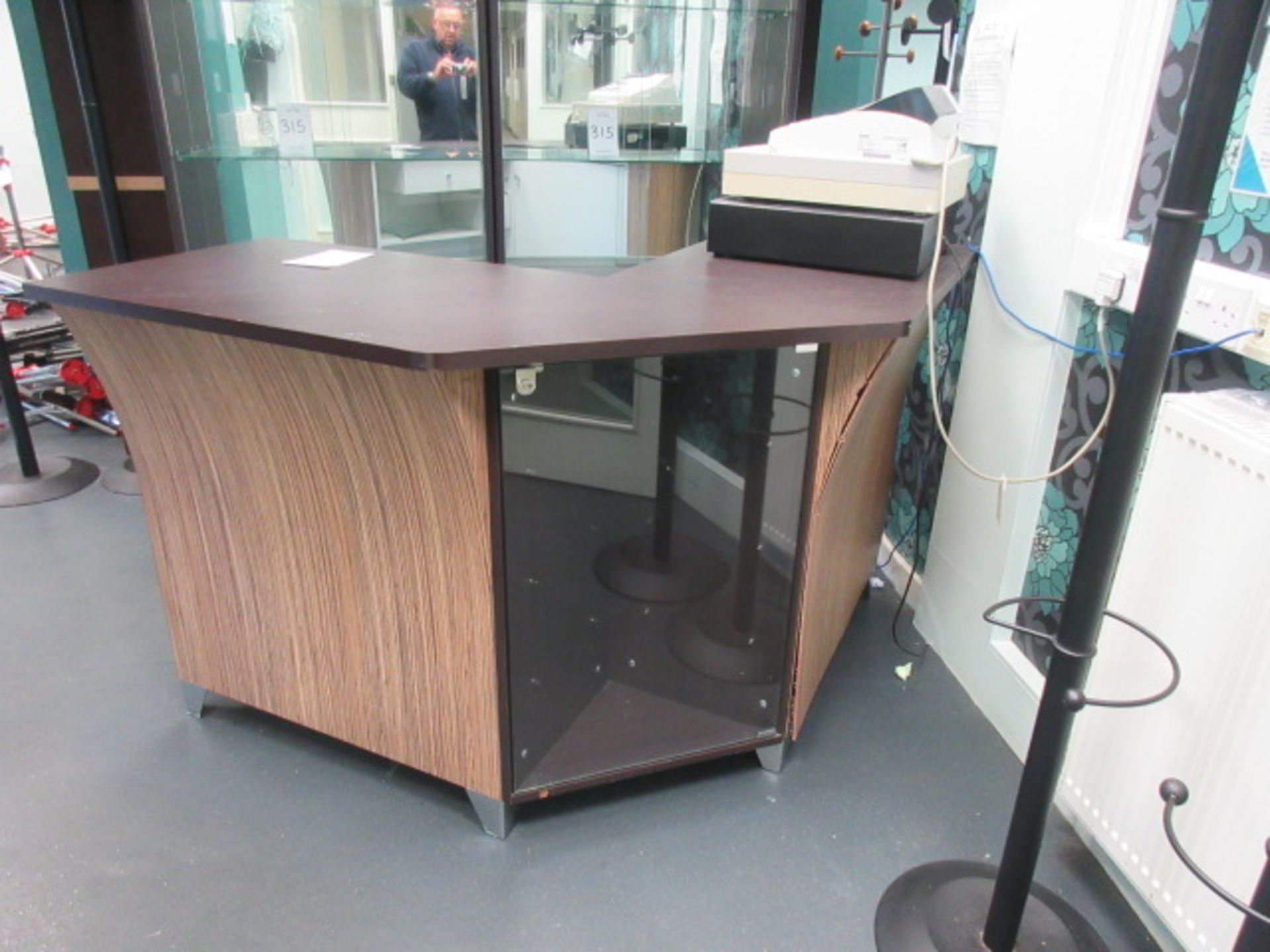 Hair Salon Reception Desk. Glass display shelves in front. Cupboard and draw in rear Holehouse road.