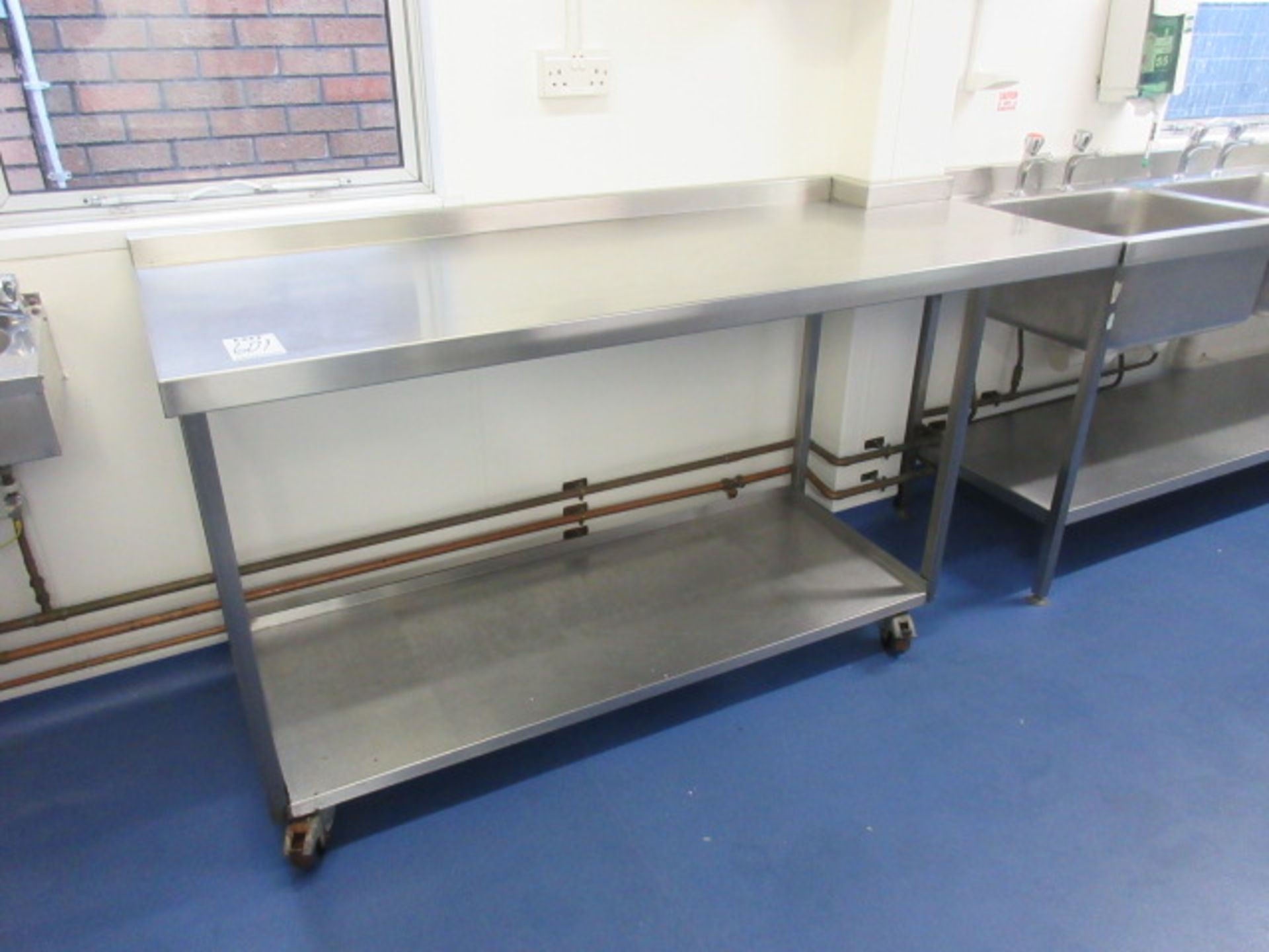 Stainless Steel Table Size 1800 mm x 650 mm. Mobile. Right hand corner cut out / legged Holehouse