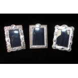 Three small Britannia silver photo frames, with gadrooned and foliate design,