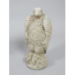 Reconstituted stone figure of a bird of prey,