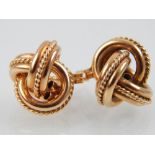 Pair of 9ct yellow gold knot ear studs