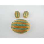 Gilt metal and turquoise 'melon' brooch and earrings en suite,