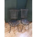 Pair of mid 20th C Continental metal garden / conservatory chairs, comb backs, scroll arms,
