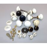 Selection of ceramic door knobs / handles, c.