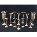 Eight various hallmarked silver single flower stem vases, with a pair of hallmarked silver vases,
