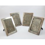 Four London hallmarked silver photograph frames, 1910, each with presentation inscription,