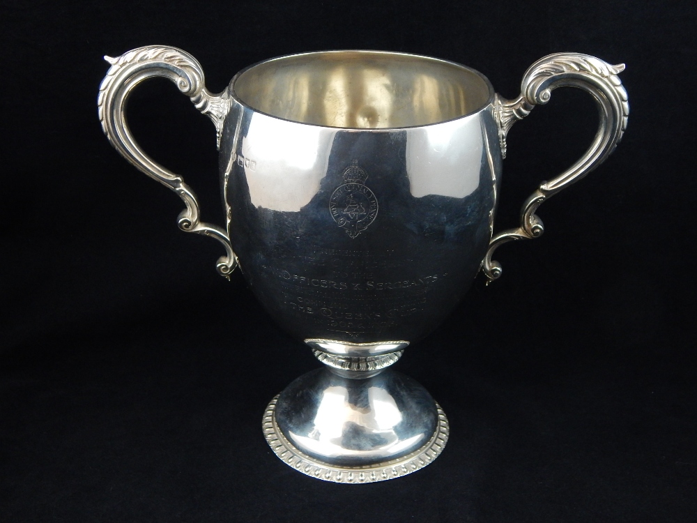 Early 19th C hallmarked silver twin-handled trophy cup, on circular foot,