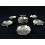 Six hallmarked silver circular dishes on ball feet,