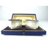 Pair of cased Mappin & Webb silver napkin rings, engine turned design, vacant cartouche, Birmingham,