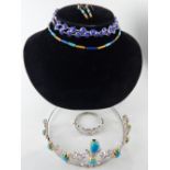 White metal and yellow metal blue stone mounted tiara, a white metal and white stone bracelet,