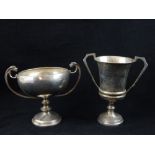 Two silver trophies, lion handles, 13cm h, London 1916, 190g, and another of cup form,
