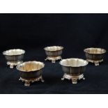 Five Victorian silver trencher salts of circular form,