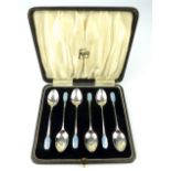Cased set of Art Deco silver and blue enamelled coffee spoons