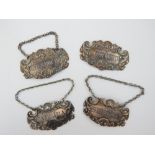Group of four silver bottle / decanter labels / tickets, King's pattern, pierced naming for F.