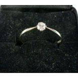 Solitaire diamond ring claw set in platinum, 18ct gold band.