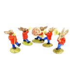 Royal Doulton Bunnykins marching Oompah band, the five figures together with a 45rpm record,