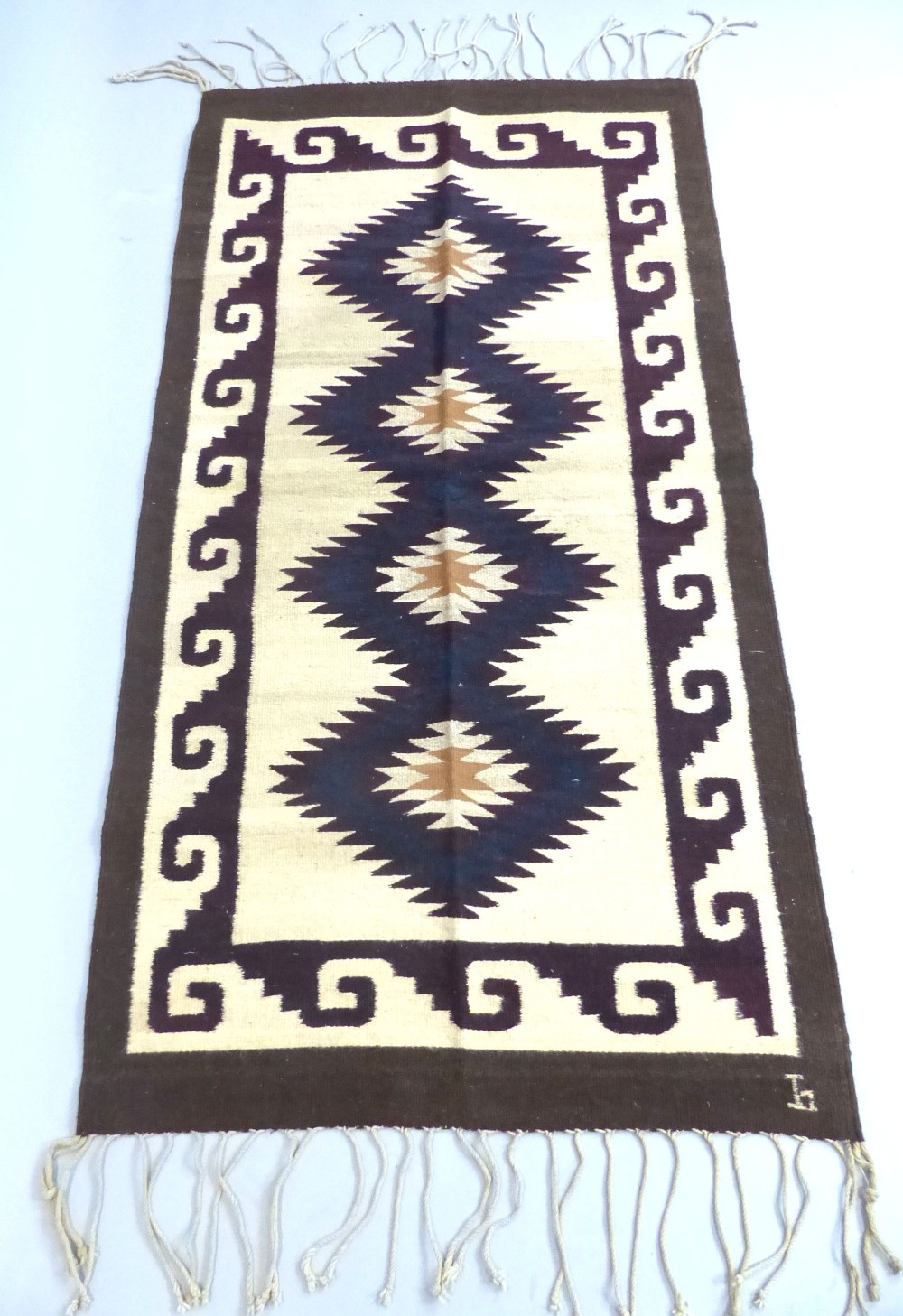 A good Zapotec rug woven by P.