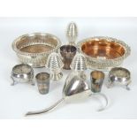 Two silver plated wine coasters, a wine funnel, beehive cruet set, egg cup,