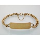 Gold identity bracelet (un-named), on kerb link chain, 9ct, approx. 18g.