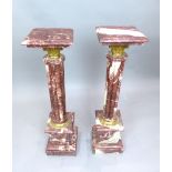 Pair of Victorian style gilt metal mounted rouge marble pedestals with cluster columns on square