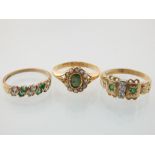 An 18ct gold, green stone and pearl ring sold together with two 9ct gold,
