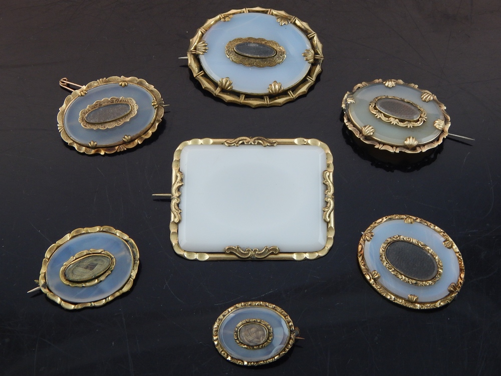 Victorian memorial brooch, with a central hair plait on an opaque glass ground within a gilt frame, - Image 2 of 2