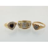 Two 9ct gold heart cluster rings and another 9ct gold ring.