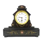 Early 20th C French black marble mantel timepiece, drum movement, enamel dial with Roman numerals,