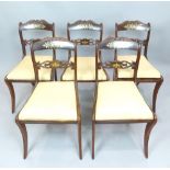 Five William IV rosewood dining chairs, with brass inlaid rail backs and yellow moire silk Trafalgar