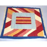 Kelim rug, light blue centre within pink, cream, red and yellow serrations and a blue border,