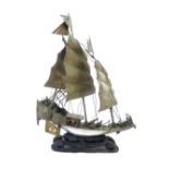 Chinese silver model of a three mast war junk on carved hardwood base, 23cm h.