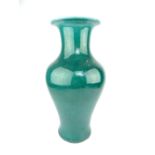 Chinese celadon glazed pottery vase of inverse baluster form, 33 cm H.