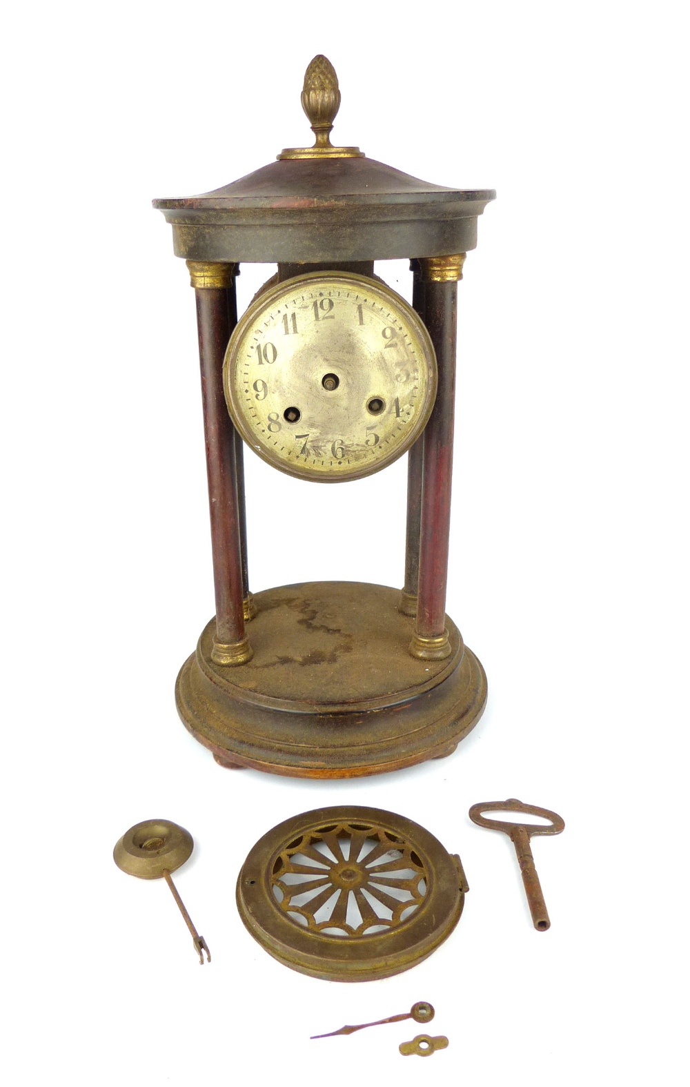 Early 20th C portico clock, pineapple finial, four columns, brass cross keys mechanism.