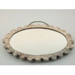 Early 20th century middle eastern white metal backed oval mirror, stamped 900,