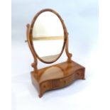 George III design mahogany toilet mirror with serpentine three drawer box base, 58 cm H