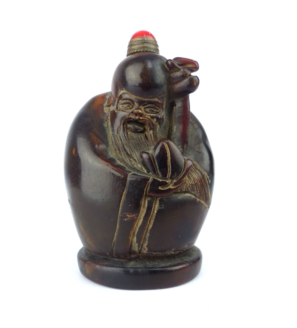 Oriental horn carved snuff bottle, in the form of a sage, 7.6cm h.