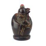 Oriental horn carved snuff bottle, in the form of a sage, 7.6cm h.