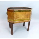 George III brass bound octagonal mahogany wine cooler, lead lined with lion mask ring handles on