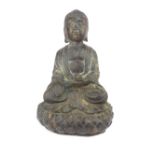 South East Asian cast bronze figurine of seated Buddha, 33cm h.