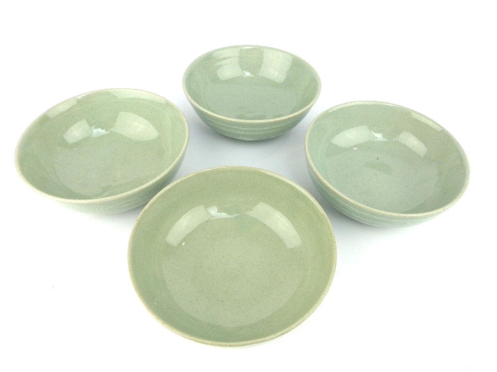 A set of four Korean porcelain footed bowls, the crackle celadon glazed bodies decorated with frieze - Image 3 of 4