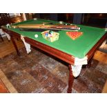 Slate bed snooker/billiard table, 6'2''x 3'3'', on turned legs, with balls, cues and a selection