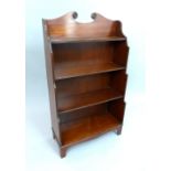 Regency design mahogany graduated open bookcase on splay feet, 104 cm H