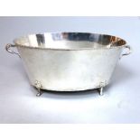 20th century silver plated twin handled wine cooler, raised on four paw feet, 52cm l.