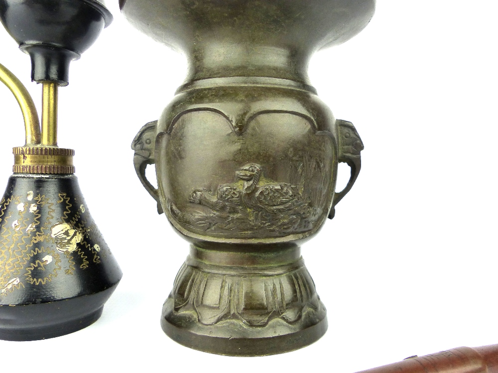 Chinese bronze opium pipe, a turned wood pipe and a small bronze vase decorated with birds among - Image 4 of 4