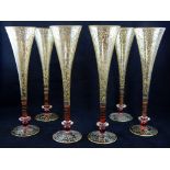 Set of six Venetian Italian champagne flutes, the trumpet glasses decorated with gilt mistletoe